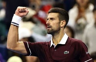 Serbia's Novak Djokovic celebrates after winning his round of 32 match against Portugal's Nuno Borges.