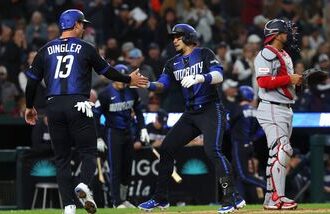 Detroit Tigers celebrate a two run home run in the fourth inning against the Washington Nationals at Comerica Park.