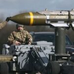 US-Israel-Iran War: US Military personnel take away Joint Direct Attack Munitions (JDAMs), removed from a US Air Force B-1 Lancer bomber at RAF Fairford in south-west England on 15 March 2026. Fairford is one of two bases, along with the Diego Garcia facility in the Indian Ocean, that the UK has given the US permission to use for 'specific defensive operations into Iran' to destroy Iranian missiles at source, the British defence minister said in a statement. (Photo by Henry NICHOLLS / AFP) (file photo)