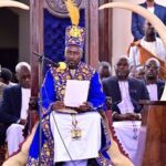 Journalist Edward Rukidi Kijanangoma delivers a speech during his coronation as king of Uganda's traditional Tooro Kingdom, in Fort Portal, Tuesday, Sept. 29, 2026. (AP Photo/Hajarah Nalwadda)