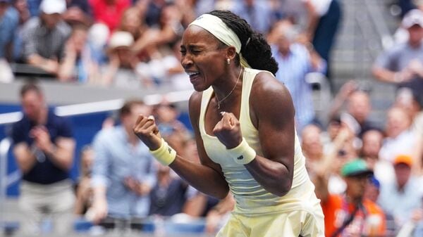 Coco Gauff, of the United States, celebrates winning a match against Mirra Andreeva, of Russia, during the quarterfinal round of the US Open tennis championships.