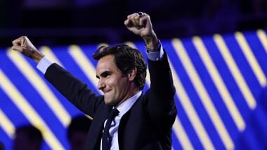 Roger Federer, former tennis player, gestures after he got his Hall of Fame ring at the U.S. Open tennis championships Monday, Aug. 31, 2026, in New York. (AP Photo/Adam Hunger)