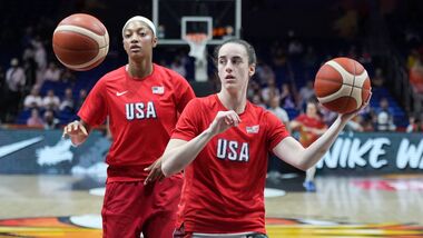 Angel Reese, of the United States, left, and United States' Caitlin Clark in action