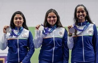 (From left) India's Vidarsa Vinod, Sonam Maskar and Elavenil Valarivan pose for photographers after winning silver medals in the women's 10m Air Rifle event at Asian Games 2026.