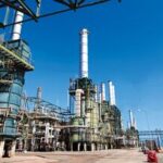 Refining towers are seen at the Zawiya oil refinery near Tripoli, Libya, in this file photo. Crude exports from Libya are likely to remain limited regardless of how quickly the country's civil conflict ends, limiting declines in Brent oil prices. (Photographer: Shawn Baldwin/Bloomberg)