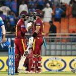 West Indies captain Shai Hope and Gudakesh Motie celebrate as their team wins by 5 wickets in the 3rd ODI against India.
