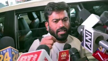 New Delhi, Oct 10 (ANI): Cockroach Janta Party (CJP) Founder Abhijeet Dipke speaks to the media while detained by the Police after the flight landed at IGI Airport, in New Delhi on Saturday. (ANI Video Grab)