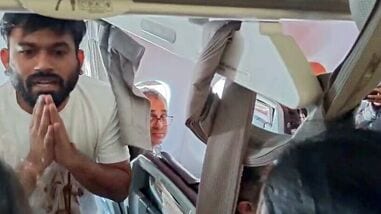 New Delhi, Oct 10 (ANI): Cockroach Janta Party (CJP) Founder Abhijeet Dipke detain by the Police after the flight landed at IGI Airport, in New Delhi on Saturday. (ANI Video Grab)