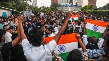 CJP supporters hold the Tricolour as they gather in large numbers near Palika Bazar during the Tiranga March, in New Delhi on Friday. (ANI Photo/ Amit)