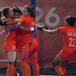 Indian players celebrate scoring a goal against team China during the women's hockey gold medal match at the Asian Games in Gifu, Japan.