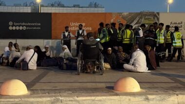 People gather outside a metro station on the road to King Khalid International Airport in Riyadh, Saudi Arabia, Saturday, Oct. 10, 2026. (AP/PTI)(AP10_11_2026_000002B)