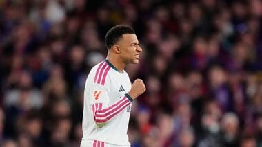 Real Madrid's Kylian Mbappe celebrates after scoring his side's second goal during a Spanish La Liga match against Barcelona.