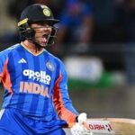 India's Abhishek Sharma celebrates his hundred during the third T20 cricket international match between New Zealand and India in Wellington, New Zealand,