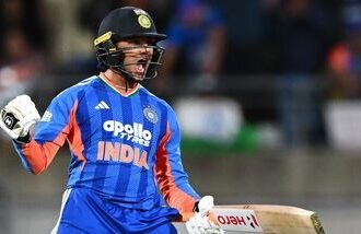 India's Abhishek Sharma celebrates his hundred during the third T20 cricket international match between New Zealand and India in Wellington, New Zealand,