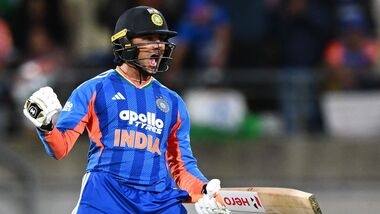 India's Abhishek Sharma celebrates his hundred during the third T20 cricket international match between New Zealand and India in Wellington, New Zealand,
