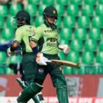 Pakistan's Maaz Sadaqat, right, and Babar Azam run between the wickets during the tri-series one-day international cricket match between Pakistan and Sril Lanka, in Lahore, Pakistan.