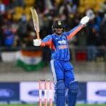 India's Abhishek Sharma celebrates his hundred during the third T20 cricket international match between New Zealand and India.