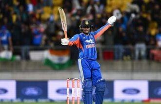 India's Abhishek Sharma celebrates his hundred during the third T20 cricket international match between New Zealand and India.