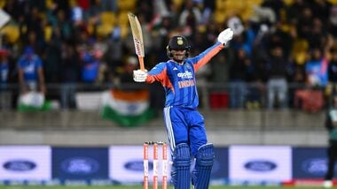 India's Abhishek Sharma celebrates his hundred during the third T20 cricket international match between New Zealand and India.