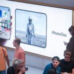 Apple iPhone Duo smartphone signage during the first day of in-store sales of Apple's latest products at Apple's Fifth Avenue store in New York, US, on Friday, Sept. 18, 2026. Apple launched new products including the iPhone 18 Pro line, AirPods 5 earbuds and fresh smartwatches. Photographer: Michael Nagle/Bloomberg