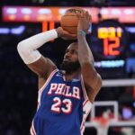 Philadelphia 76ers forward LeBron James shoots during the second half of an NBA basketball game against the New York Knicks.