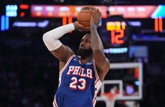 Philadelphia 76ers forward LeBron James shoots during the second half of an NBA basketball game against the New York Knicks.