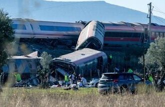 Emergency services attend to the victims at the scene of a collision between two trains in Urda, Spain, on Wednesday.