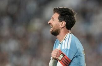 Argentina's Lionel Messi gestures during his final match for the national team against Benin in Buenos Aires on Tuesday.