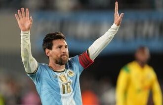 Argentina's Lionel Messi celebrates after scoring his goal from the penalty spot during his final match for the national team against Benin in Buenos Aires on Tuesday.