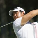 South Korea's Tom Kim, also known as Kim Joo-hyung, plays a shot in the men’s singles in golf at the Asian Games.