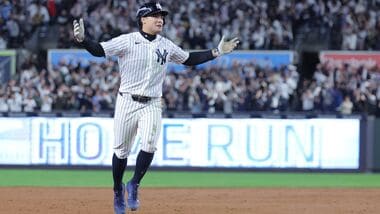 New York Yankees shortstop Anthony Volpe (11) reacts after a double because of fan interference during the sixth inning against the Tampa Bay Rays in game three of the ALDS for the 2026 MLB Playoffs at Yankee Stadium.