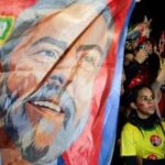 Supporters gather to watch Brazil's President Luiz Inacio Lula da Silva, the Workers' Party (PT) candidate for re-election, speak after his victory in the presidential runoff election, at Paulista Avenue, in Sao Paulo, Brazil, October 25, 2026. REUTERS/Brian Snyder/File Photo
