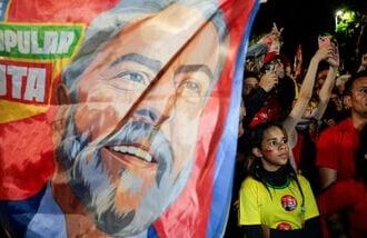 Supporters gather to watch Brazil's President Luiz Inacio Lula da Silva, the Workers' Party (PT) candidate for re-election, speak after his victory in the presidential runoff election, at Paulista Avenue, in Sao Paulo, Brazil, October 25, 2026. REUTERS/Brian Snyder/File Photo