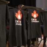 Forever Canadian T-shirts hang on display at a pro-Canada rally at Polish Hall in downtown Edmonton, Alberta, ahead of the referendum results on October 19, 2026. Alberta votes today to determine if it wants to pursue a binding referendum on leaving Canada, with Prime Minister Mark Carney warning a separatist win would bring dangerous uncertainty during a trade war with the United States. Polls indicate less than a quarter of people in the western Canadian province support independence. (Photo by Megan Albu / AFP)