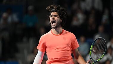 Spain's Carlos Alcaraz celebrates beating Czech Republic's Jiri Lehecka in the men's singles final during the Japan Open tennis tournament.