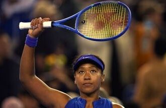 Naomi Osaka, of Japan, celebrates after defeating Maria Timofeeva, of Uzbekistan in a women's singles second round match during the China Open tennis tournament held in Beijing, Friday, Oct. 2, 2026. (AP Photo/Ng Han Guan)