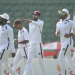 West Indies' captain Roston Chase (C) walks onto the field alongwith his teammates on the fourth day of the first test cricket match between Bangladesh and West Indies.