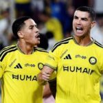 Al Nassr's Cristiano Ronaldo celebrates scoring their third goal against Al Kholood in Saudi Pro League.