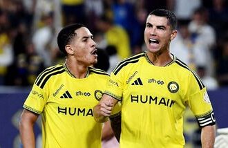 Al Nassr's Cristiano Ronaldo celebrates scoring their third goal against Al Kholood in Saudi Pro League.