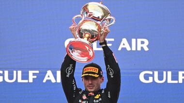 Race winner Red Bull Racing's Dutch driver Max Verstappen lifts his trophy during podium ceremony of the Formula One Bahrain Grand Prix.