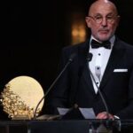 Spain head coach Luis de La Fuente speaks on stage after winning the Trophy for the Men's Coach of the Year during the 2026 Ballon d'Or France Football award ceremony in London on Monday.