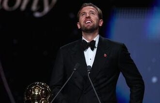 England and Bayern Munich forward Harry Kane reacts after receiving the Ballon d'Or award during a ceremony in London on Monday.
