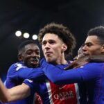 Paris Saint-Germain's French midfielder #11 Maghnes Akliouche (C) celebrates with teammates after scoring his team's fourth goal in their UEFA Champions League match against Manchester City on Wednesday.