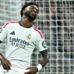 Real Madrid's Brazilian forward #07 Vinicius Junior reacts after a missed chance during their UEFA Champions League first round day 3 football match between Real Madrid CF and RB Leipzig at the Santiago Bernabeu stadium in Madrid on October 21, 2026. (Photo by Javier SORIANO / AFP)