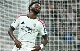 Real Madrid's Brazilian forward #07 Vinicius Junior reacts after a missed chance during their UEFA Champions League first round day 3 football match between Real Madrid CF and RB Leipzig at the Santiago Bernabeu stadium in Madrid on October 21, 2026. (Photo by Javier SORIANO / AFP)