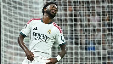 Real Madrid's Brazilian forward #07 Vinicius Junior reacts after a missed chance during their UEFA Champions League first round day 3 football match between Real Madrid CF and RB Leipzig at the Santiago Bernabeu stadium in Madrid on October 21, 2026. (Photo by Javier SORIANO / AFP)