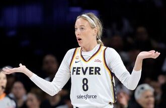 Indiana Fever guard Sophie Cunningham (8) reacts