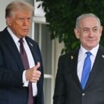 (FILES) US President Donald Trump with Israeli Prime Minister Benjamin Netanyahu