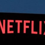 The Netflix logo is seen on the Netflix, Inc. building on Sunset Boulevard in Los Angeles, California.