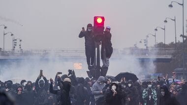 Protesters during a demonstration in Paris, France, on Oct. 24. A new round of protests is set to hit France on Saturday, raising fears of a repeat of last weekend's riots